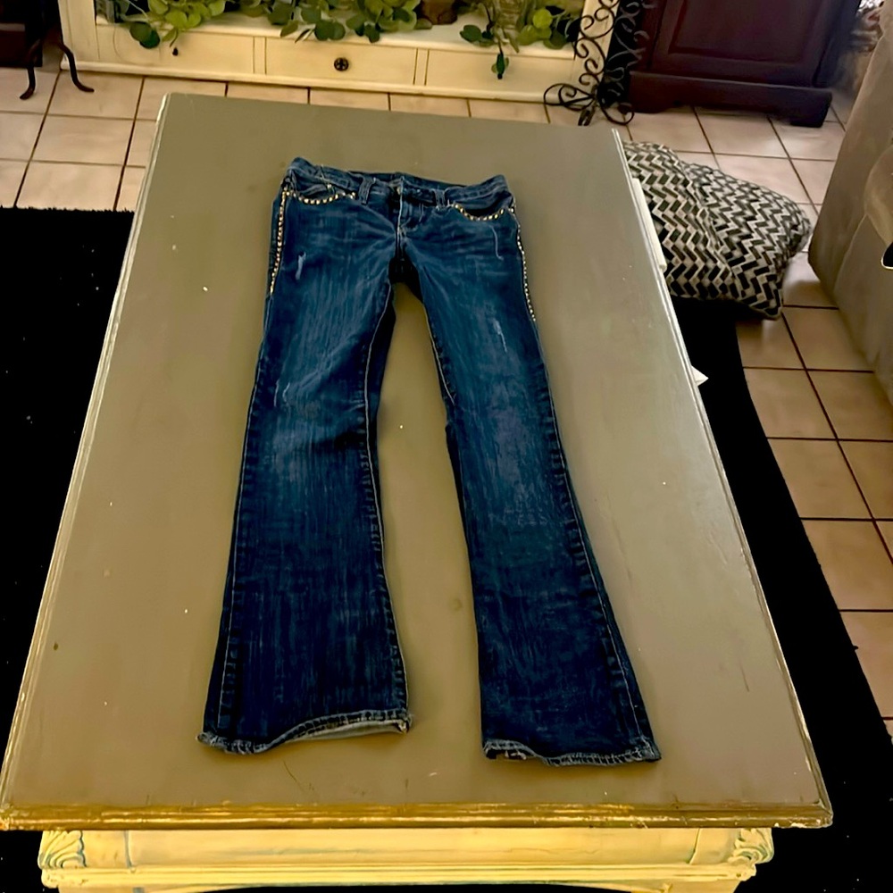 Rock and Republic Jeans. Size 0. Gold bling on side and back.